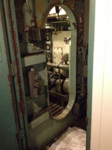 The ship still needs help - many areas are not fully restored.  We passed an open door, which our guide informed us led to the control rod drive hydraulic pump room.  Photo for ANS by Will Davis.